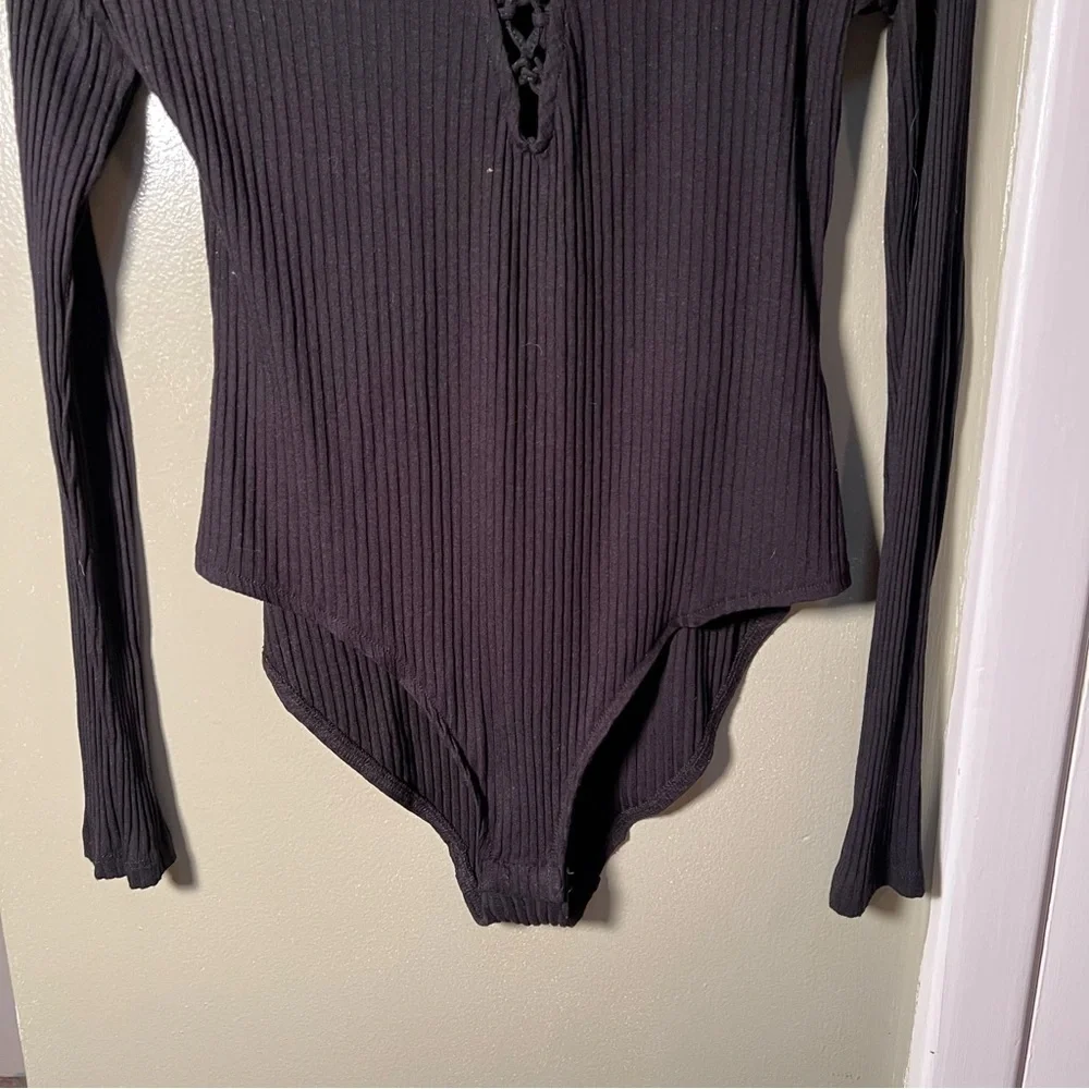 H&M Women's Size Medium Bodysuit Long Sleeve Lace Up Black Ribbed Deep V-Neck